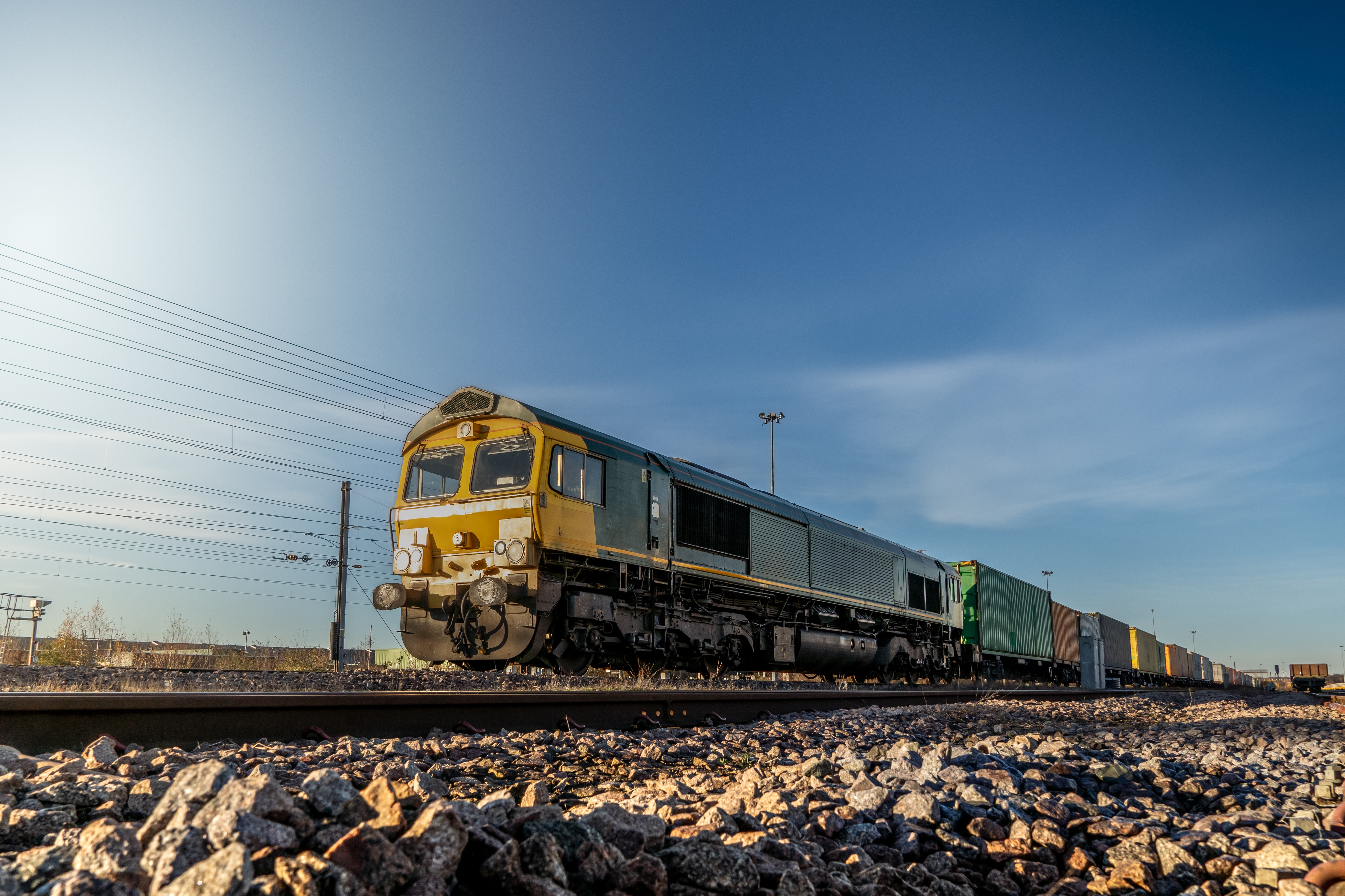 Passenger train on modern railway line illustrating rail performance optimization and infrastructure reliability